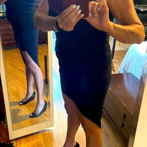 2pc outfit. NEVER WORN.  Large.  Top is strapless.  Mini skirt w/ overlay.